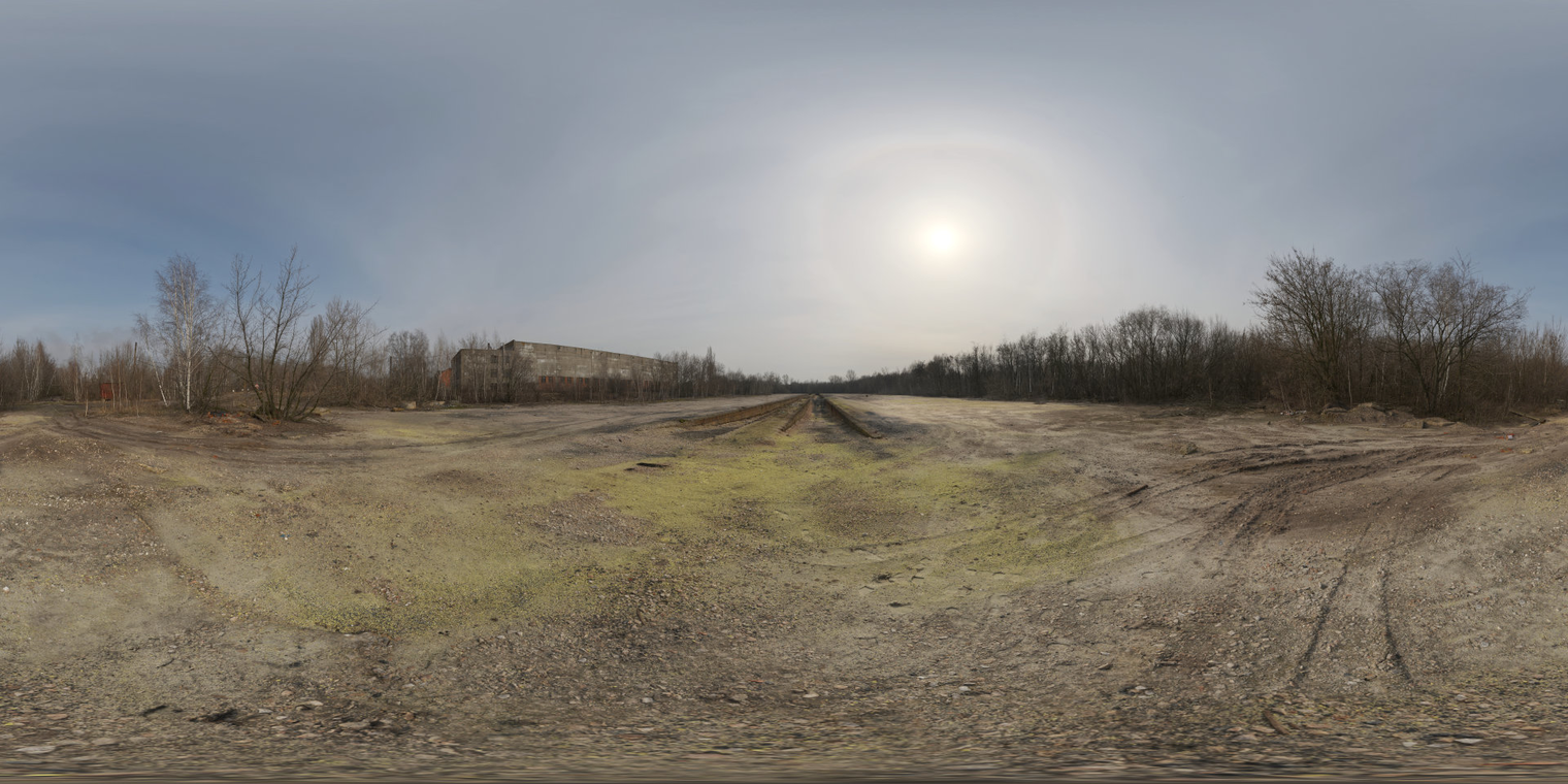 Free 16K HDRI, unclipped - soft winter sun in a partly cloudy morning, natural medium-contrast light across an abandoned industrial field with bare trees.