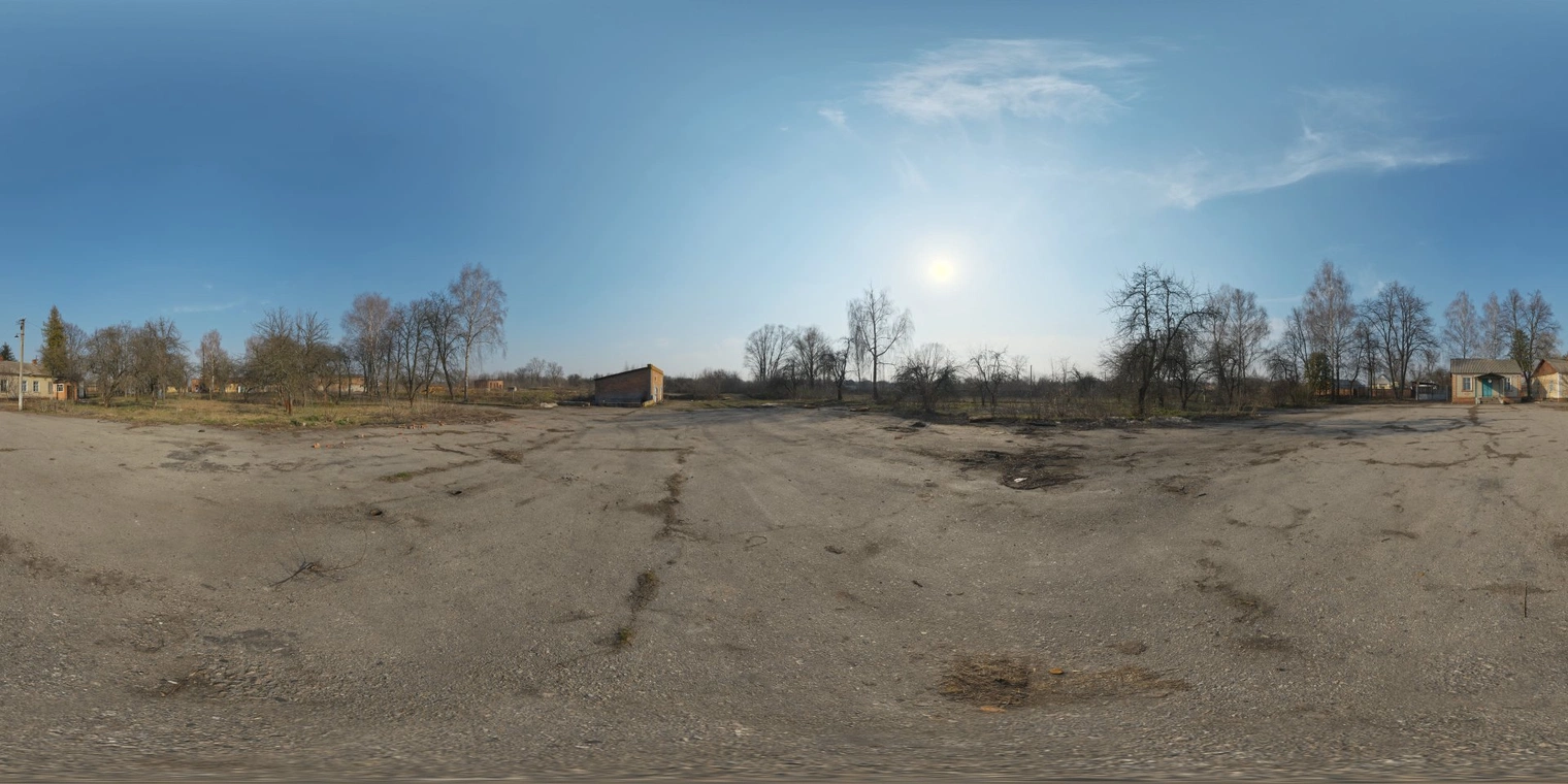 Free 16K unclipped HDRI of an abandoned tank farm parking: high-contrast, partly cloudy morning sun, natural warm sidelighting, long shadows and sparse trees.