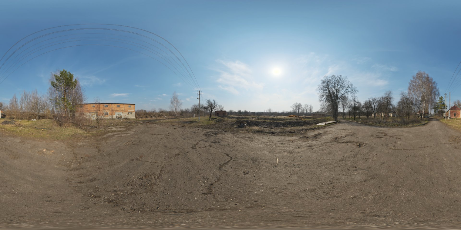Free 16K HDRI, unclipped. Morning/afternoon partly cloudy sky with a bright sun, high-contrast natural light over an abandoned tank farm road framed by trees.