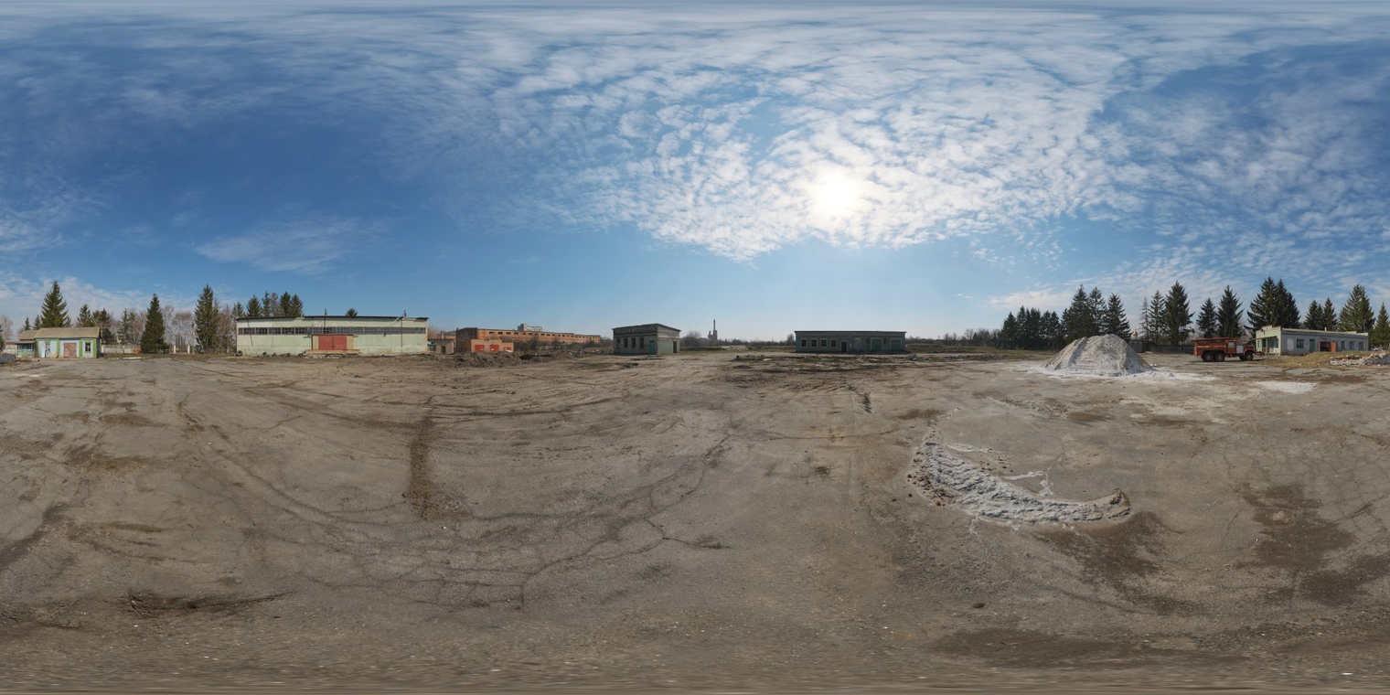 Free 16K, unclipped HDRI of an abandoned tank farm, midday sun with partly cloudy sky, high-contrast natural light on cracked asphalt parking and cool shadows.
