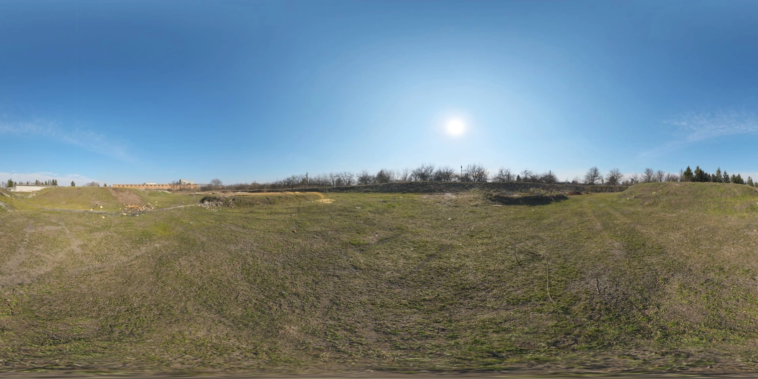 Free 16K, unclipped HDRI: bright afternoon sun over grassy fields and low hills, partly cloudy sky with high-contrast natural light for crisp shadows.