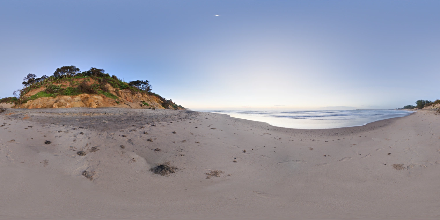 Unclipped, free 24K HDRI of a beach at dawn: soft blue hour light, pale sky gradient, faint sun on horizon, cool sand tones, gentle waves.