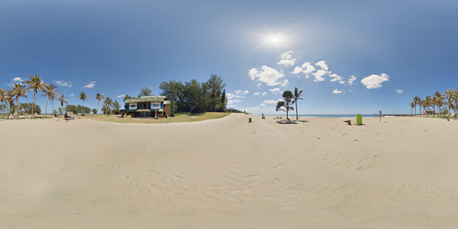 Unclipped 24K free HDRI of a sunny beach with palm trees, bright midday sun, few clouds, crisp high-contrast lighting, warm sand and blue sea under clear sky.