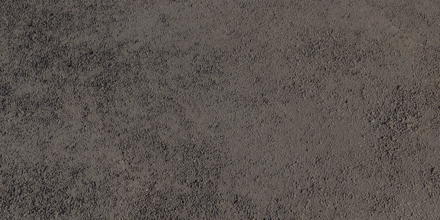 Free 8K asphalt texture: worn, dirty road surface with a coarse, rough aggregate, compacted bumps and subtle grime discoloration.