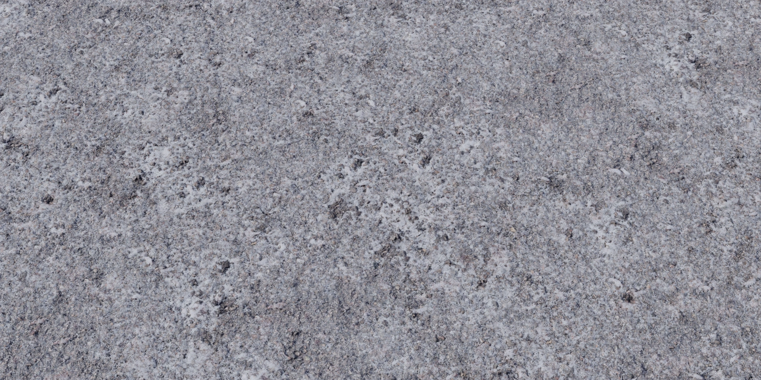 Free 8K texture of rough urban asphalt dusted with patchy snow: gritty grey aggregate, scattered white flakes, uneven, slightly porous surface.
