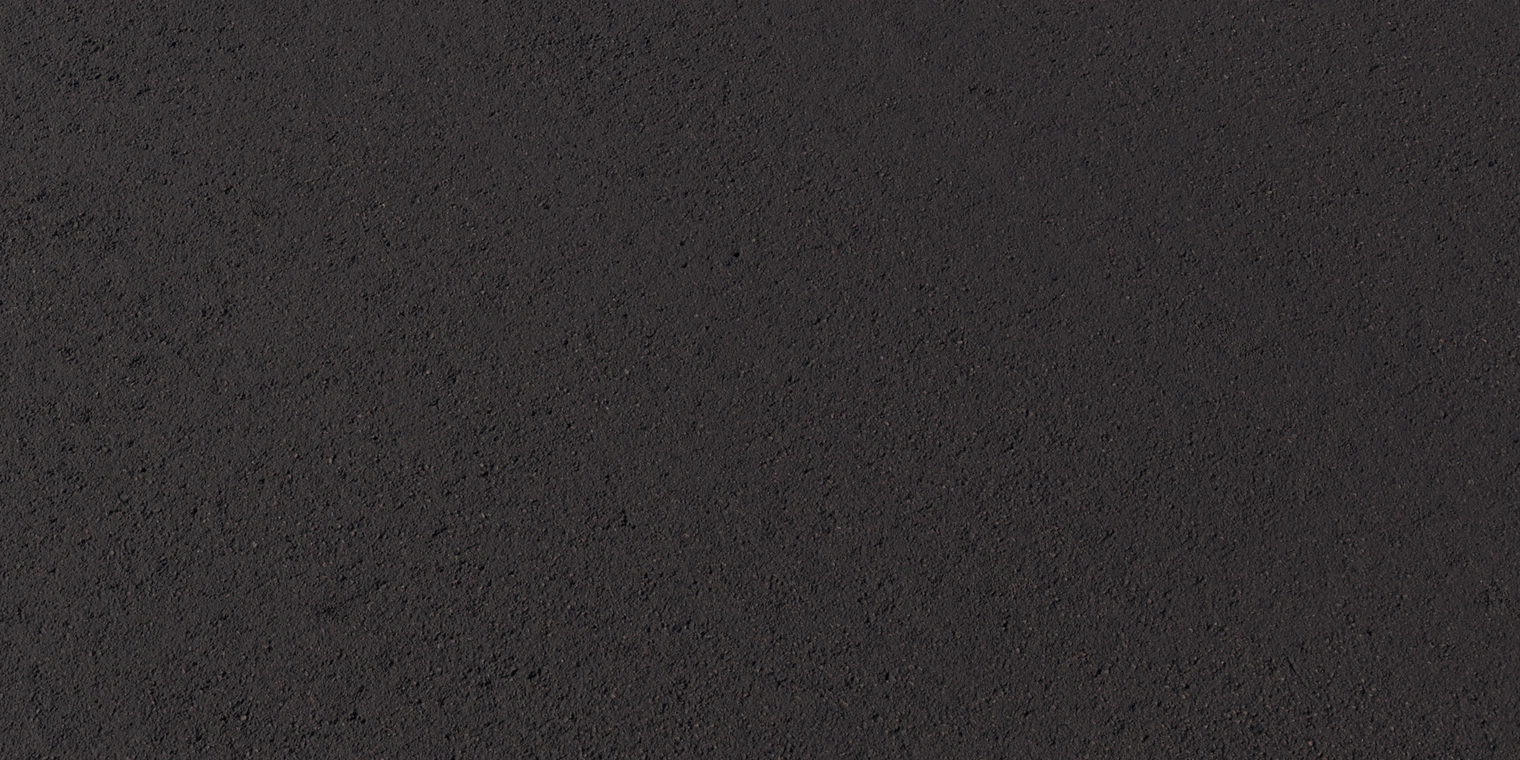 Free, 8K asphalt track texture: dark, fine-grained tarmac with subtle aggregate, worn micro-roughness and a low-gloss, slightly weathered surface.