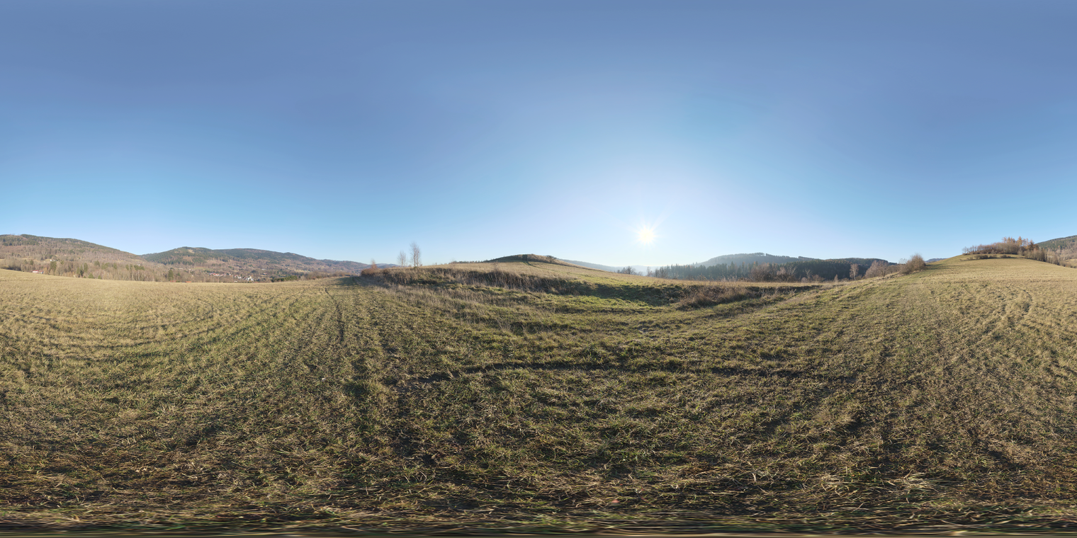 Free unclipped 29k HDRI: clear late-morning sun over autumn rolling hills; warm low sunlight, crisp blue sky, high contrast and long grassy shadows.