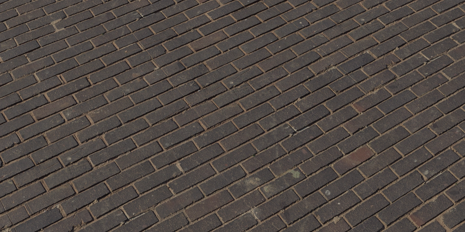 Free 8K brick floor texture with dark brown pavers, tight mortar lines, subtle wear and chips, scattered stains and scratches, and a slightly rough, low-sheen surface.