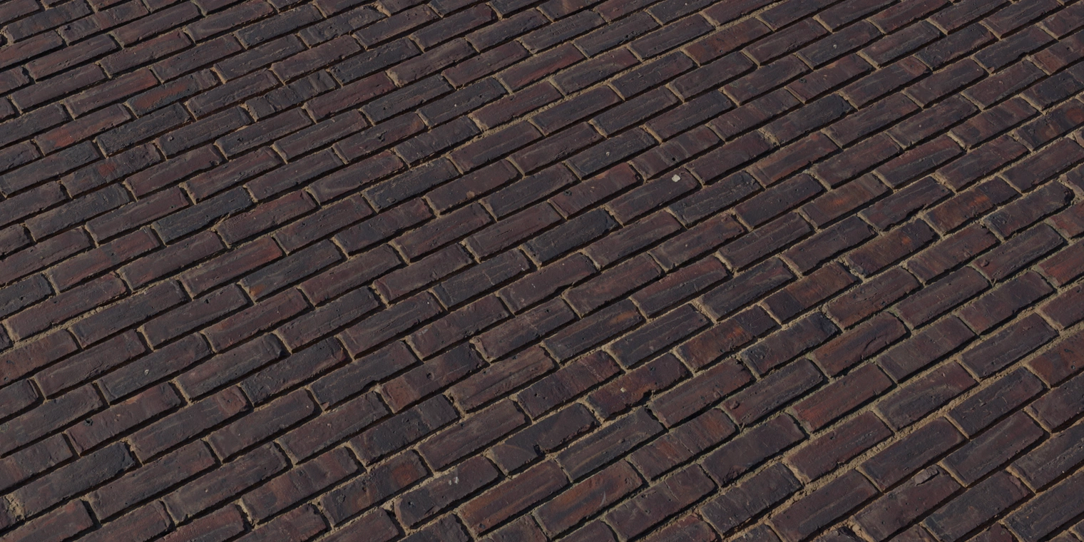 Free 8K texture of dark, weathered exposed brick - rough, chipped brick faces, recessed mortar lines and a subtle damp sheen.