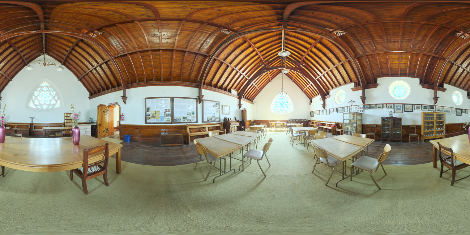 Free 24k unclipped HDRI, sunlit church museum interior with warm morning/afternoon natural light, stained-glass accents, vaulted wood ceiling, medium contrast.