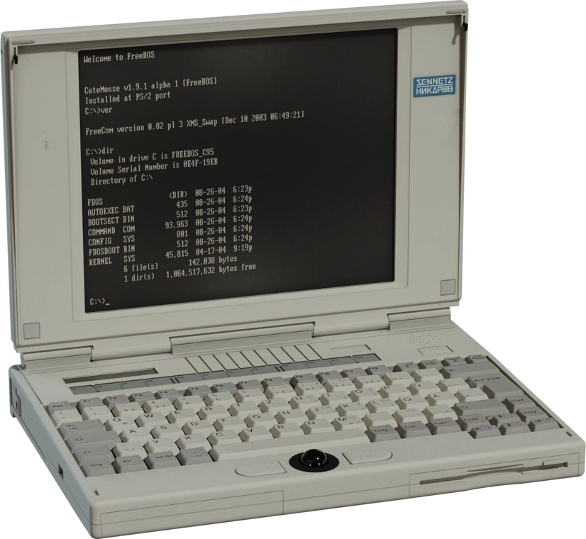 Free 4K model of a retro beige laptop with DOS screen, chunky keycaps, built-in trackball, floppy slot, thick hinges, and period-correct details.