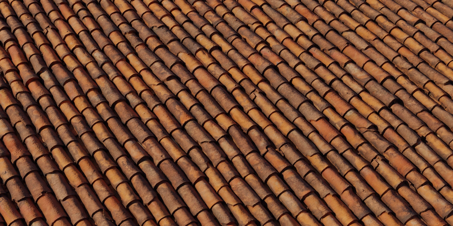 Free 8K texture of weathered interlocking clay roof tiles with overlapping terracotta shingles, rough worn surface, dirt stains and subtle moss.