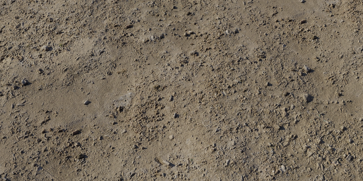Free 8K texture of coarse coastal sand: compacted brown grains, rough uneven surface with small stones and dirt clumps, high-detail surface relief.