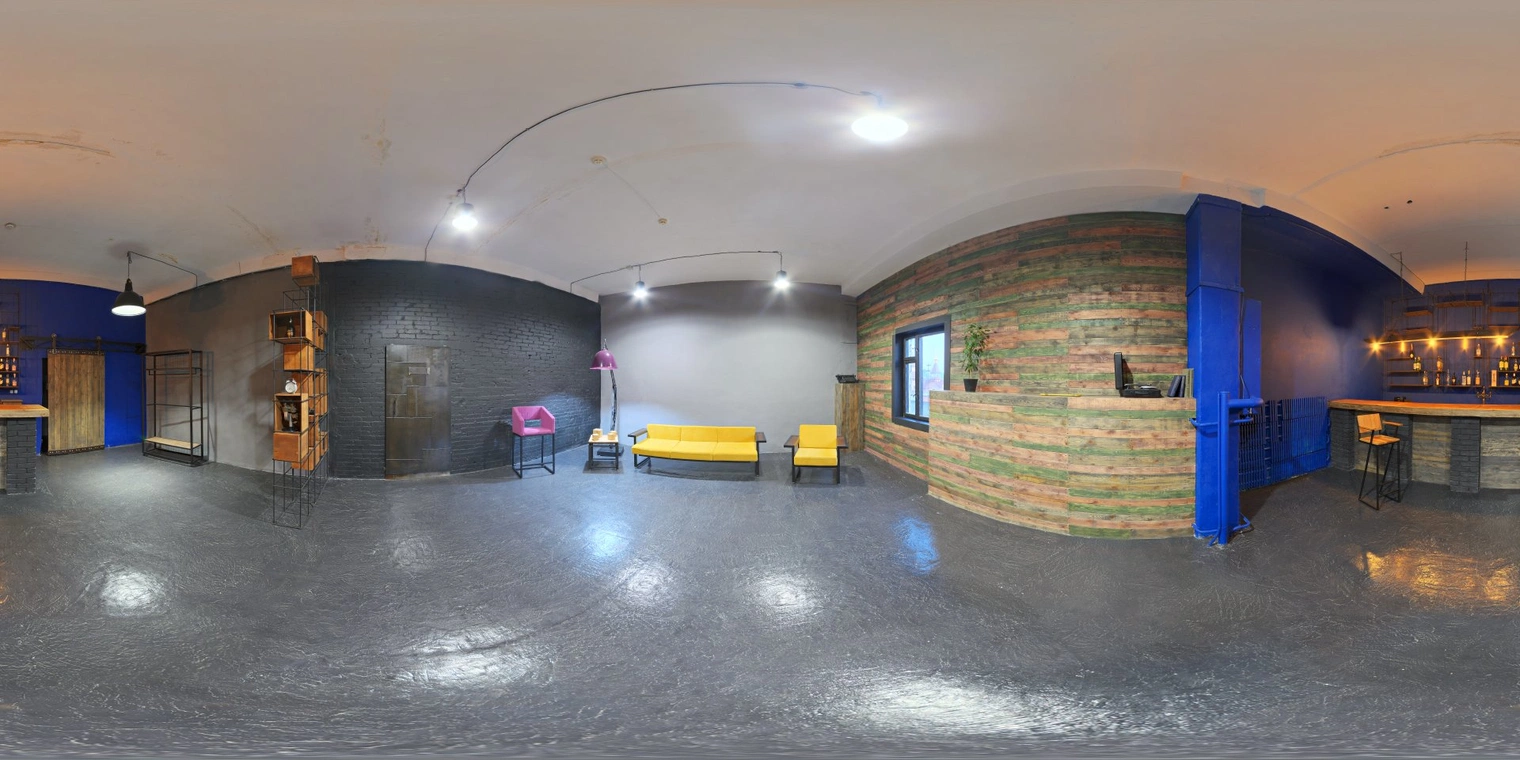 Free 16K unclipped HDRI of a colorful indoor studio: high contrast lounge lighting with warm bar glows, cool overhead spots and strong reflections.