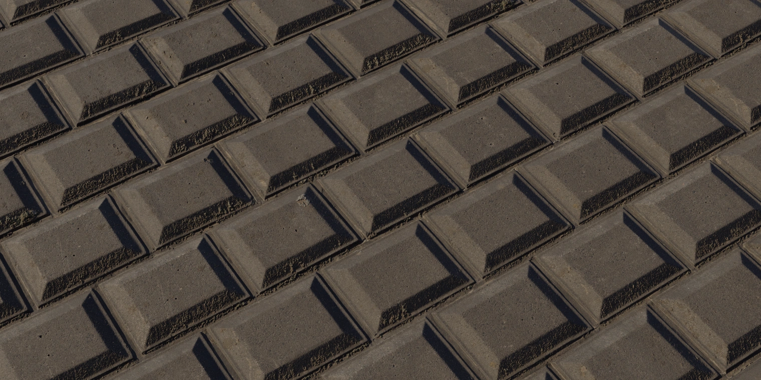 Free 16K concrete block wall texture featuring dark gray beveled blocks, sharp joints with grime buildup, tiny pores, chips, and a gritty matte finish.