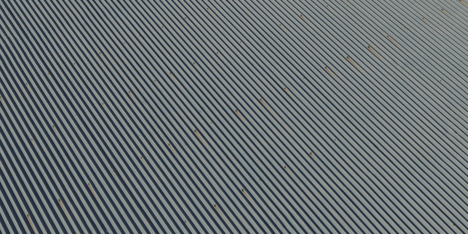 Free 8K texture of narrow corrugated galvanized steel, subtle scratches and small rust spots.