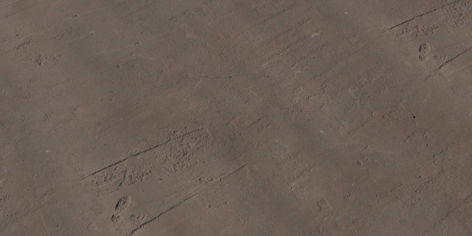 Free 8K texture of a timeworn, damaged concrete floor with rough, scuffed surface, cracks, chips and subtle scratches on a dark, cemented finish.