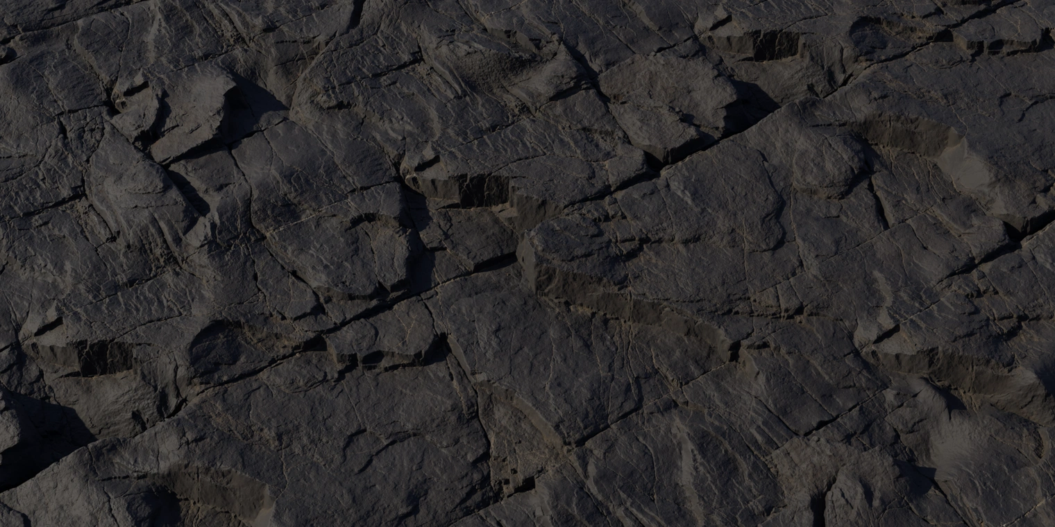 Free 8K dark rock texture with layered fractures, deep crevices and chipped edges, charcoal tone and rough, slightly matte surface with subtle highlights.