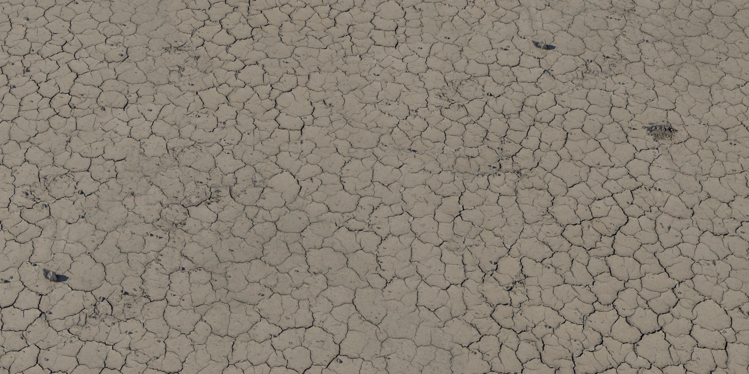 Free 8K texture of dry, cracked ground - compact, brittle baked earth with rough fissures, sandy-brown tones and fine-grain surface detail.