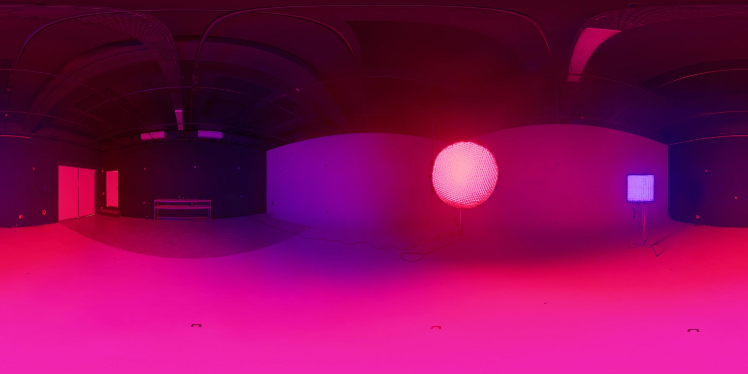 Free HDRI: Ferndale Studio 06 - high-contrast indoor studio with vivid red and blue practical lamps, deep shadows and directional light for stylized portraits, product and cinematic renders.