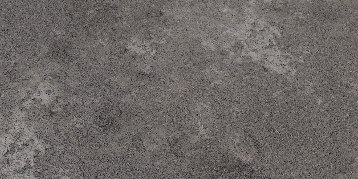 Free 8K texture: coarse grey gravelly concrete with rough, uneven surface, compacted dirt patches and strong low-sheen surface detail.