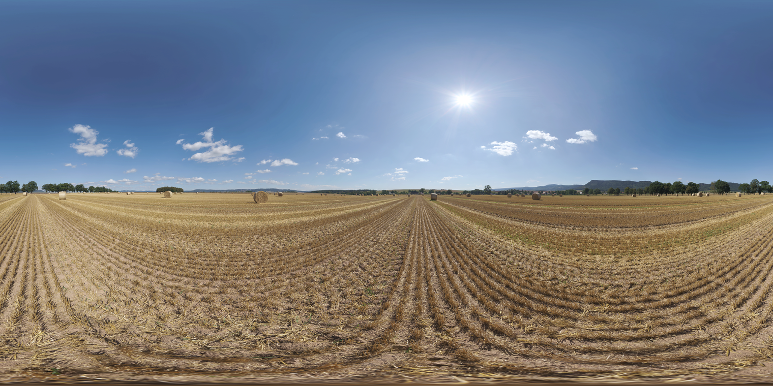Free 16k unclipped HDRI - bright midday sun over harvested hay fields, warm high-contrast light, scattered clouds and strong directional shadows.