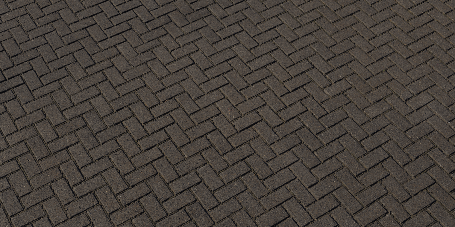Free 16K herringbone pavement texture showing weathered, darkened bricks with rough, worn surfaces, dirt-filled joints and subtle age discoloration.