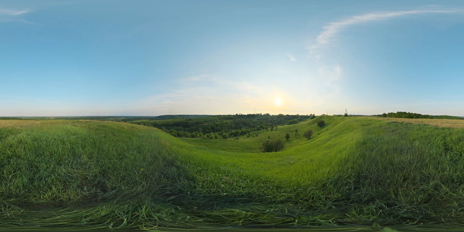 Free 16K unclipped HDRI of a grassy hilltop at golden-hour, partly cloudy sky, soft warm sunlight with medium contrast and a calm, natural outdoor mood.
