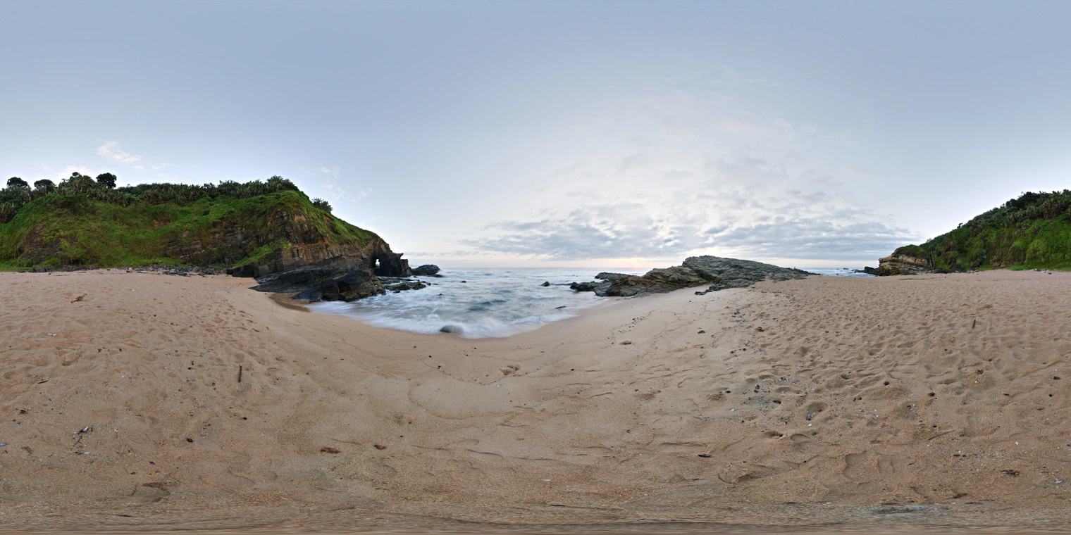Free 24K unclipped HDRI of a rocky beach at sunrise: cool, soft dawn light, broken clouds, gentle waves and wet sand, subtle shadows.