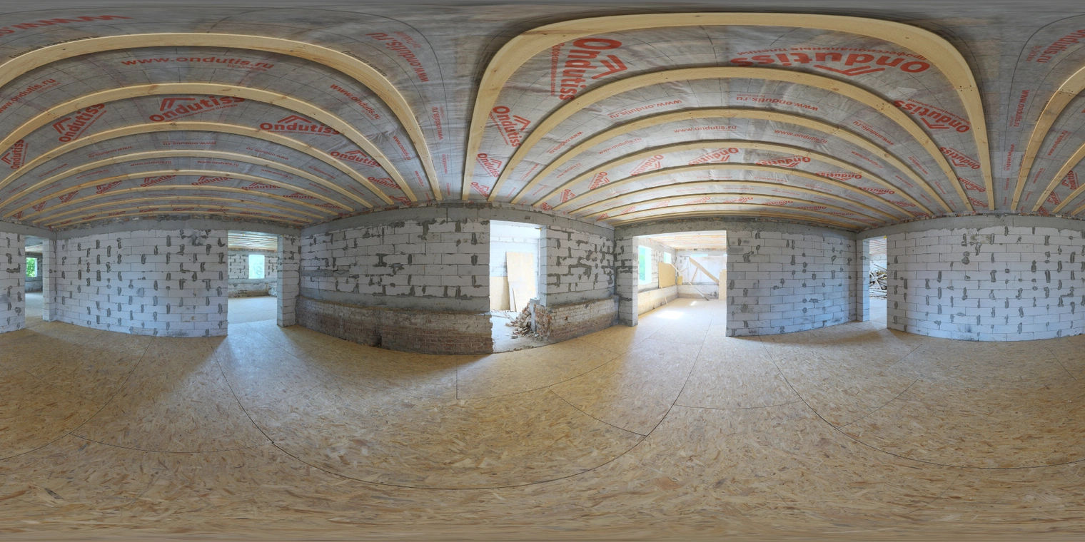 Free 16K unclipped HDRI: empty interior construction at midday with soft, low-contrast diffuse daylight, neutral wood, brick and chipboard.