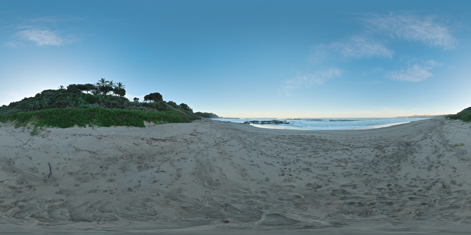 Unclipped and free 20K HDRI. Calm beach afternoon under clear blue sky, concealed sun with gentle warmth, soft contrast, cool ocean tones.