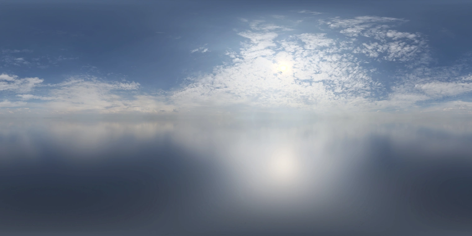 Free 24K unclipped HDRI. Midday partly cloudy sky with cool blue tones, strong directional sun, high-contrast lighting and soft cloud shafts.
