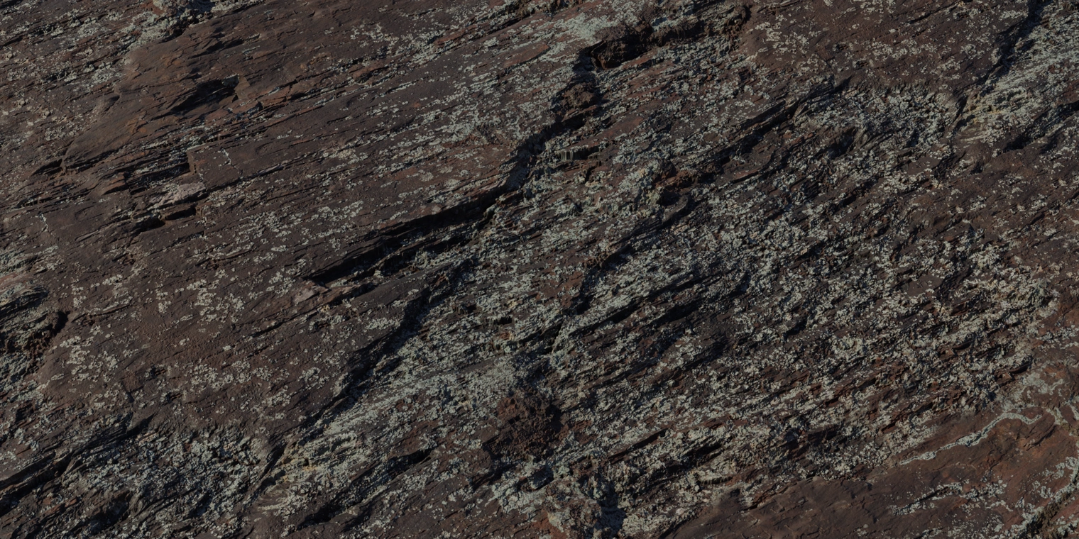 Free 8K texture of rugged, weathered rock with pale-green lichen patches, layered stone grain, rough microdetail and a subtle damp sheen.