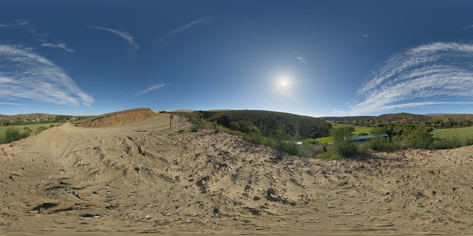 Unclipped, free 24K HDRI of a rural hillside under clear blue sky: bright sun, hard shadows, warm dry earth, green valley, crisp afternoon light.