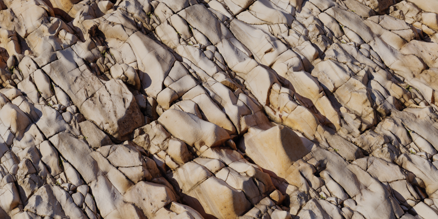 Free 8k marble cliff texture: weathered metamorphic rock with creamy-tan veining, deep fissures, cracks and subtle dirt; rough, fractured strata.