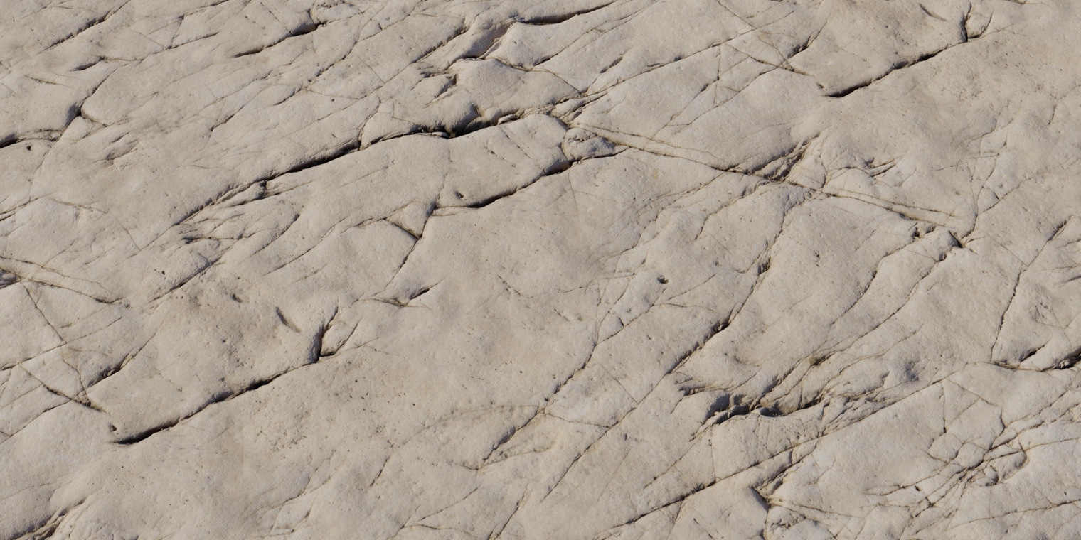Free 8K texture of weathered beige marble rock with craggy fractures, fine veins, and uneven matte surface, subtle color variation and chipped details.