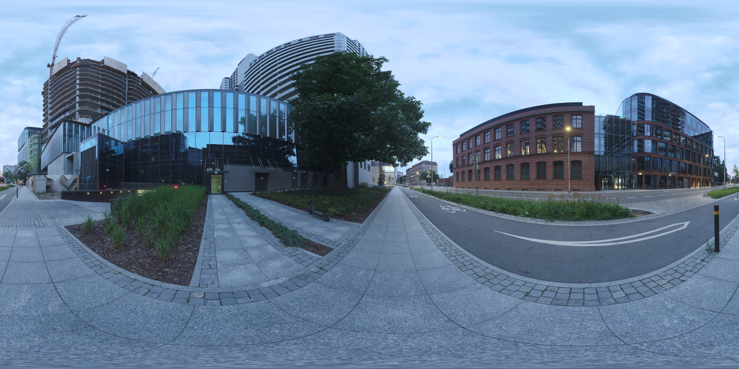 Free, unclipped 20k HDRI - soft dusk light on a European office street, low-contrast partly cloudy sky, cool evening tones with warm streetlamps.