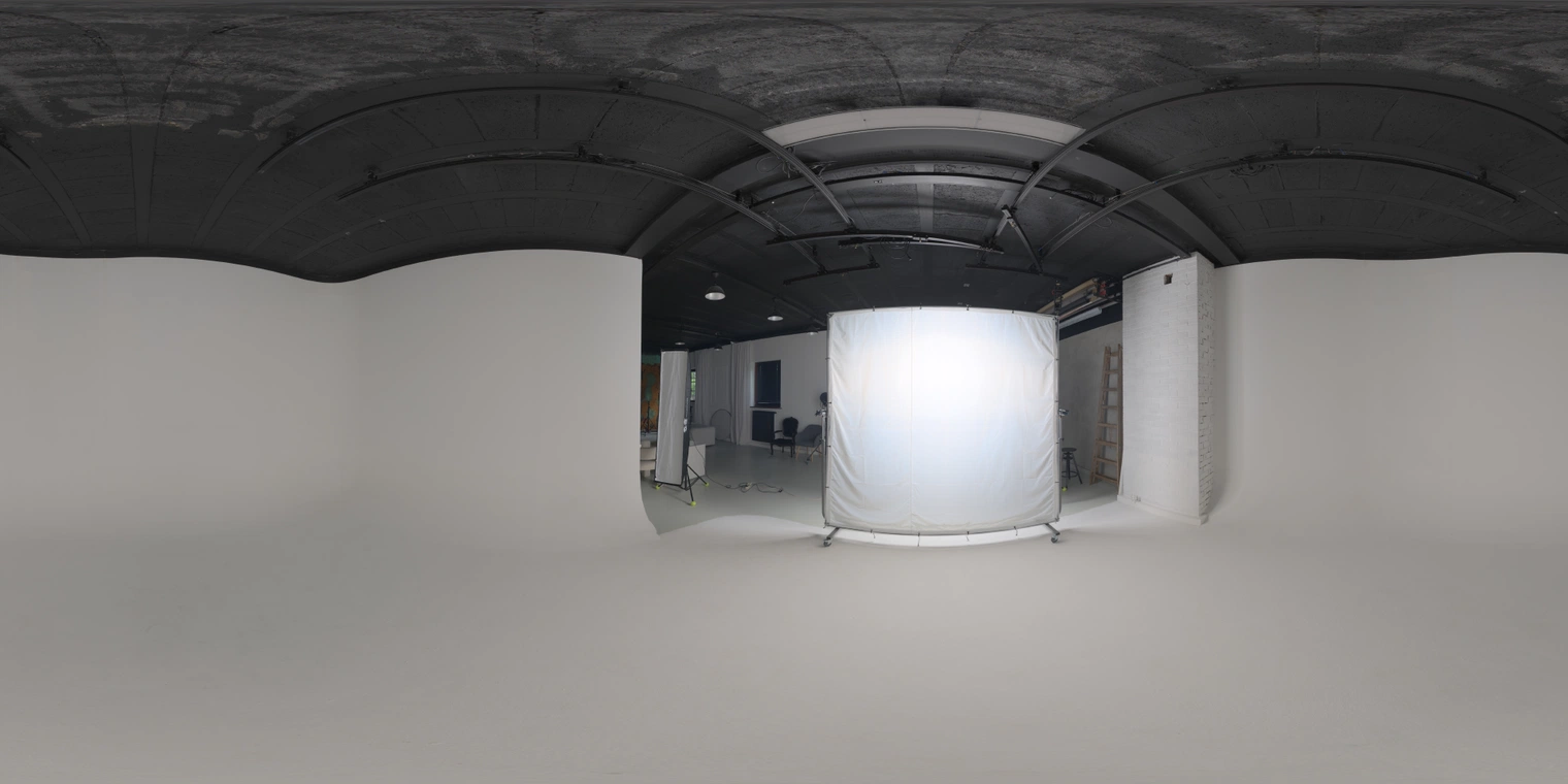 Unclipped, free 20K HDRI - soft, low-contrast indoor studio with a large rectangular softbox and dark ceiling; ideal for product, portrait and lookdev lighting.