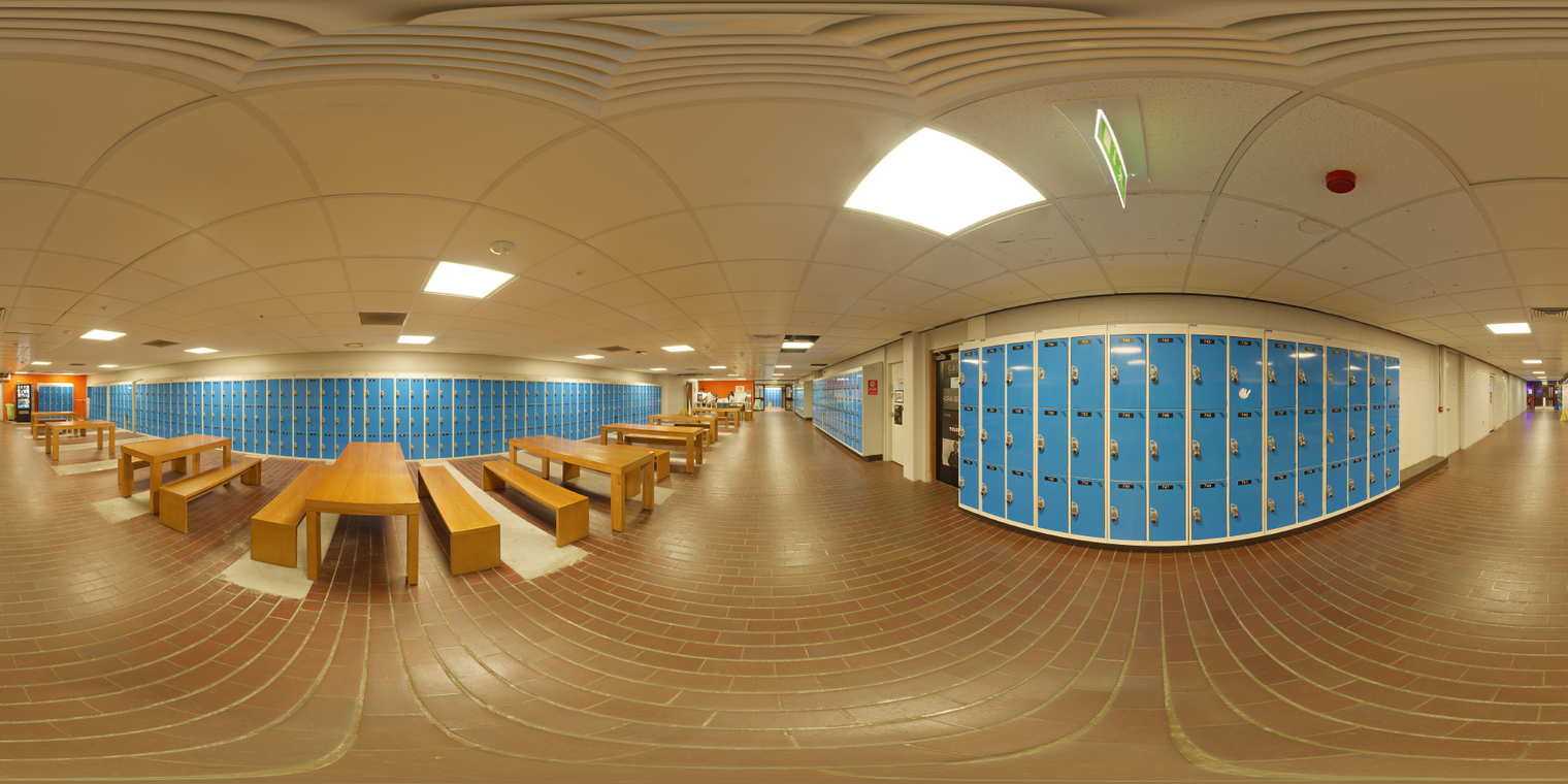 Free 20k unclipped HDRI: fluorescent cafeteria light, even soft shadows, bright ceiling panels, cool reflections on blue lockers and warm tiled floor; quiet vibe.