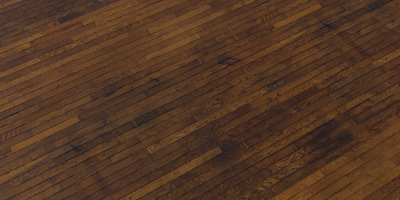 Free 16K texture of aged varnished hardwood planks with visible grain, scratches and wear, versatile interior wooden flooring material for realistic scenes.