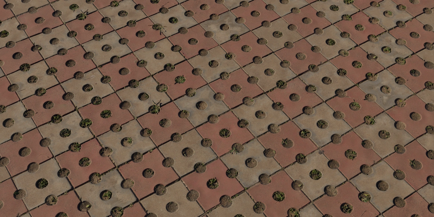 Free 16K texture of weathered patterned concrete pavers - red and beige squares with circular recesses, cracks, discoloration, dirt and moss in joints.
