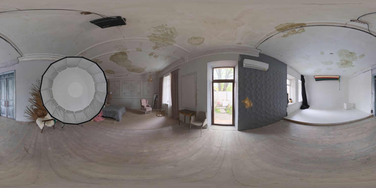 Free 16K unclipped HDRI of soft, low-contrast morning light in an overcast indoor photo studio - large softbox, wooden floor, plaster ceiling and muted natural tones.