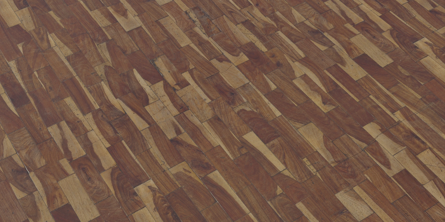 Free 8K texture of varnished brown plank flooring with worn, stained and scratched boards, chipped edges and a smooth glossy finish showing dirt and damage.