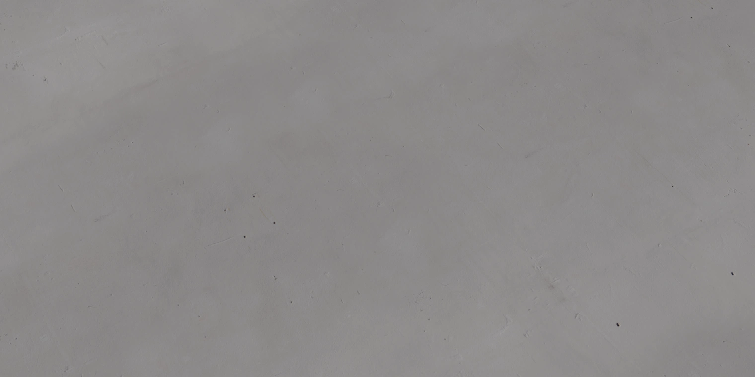 Free 16K plaster wall texture: matte gray, rough and scuffed plaster-concrete surface with subtle scratches, pits and faint trowel marks.