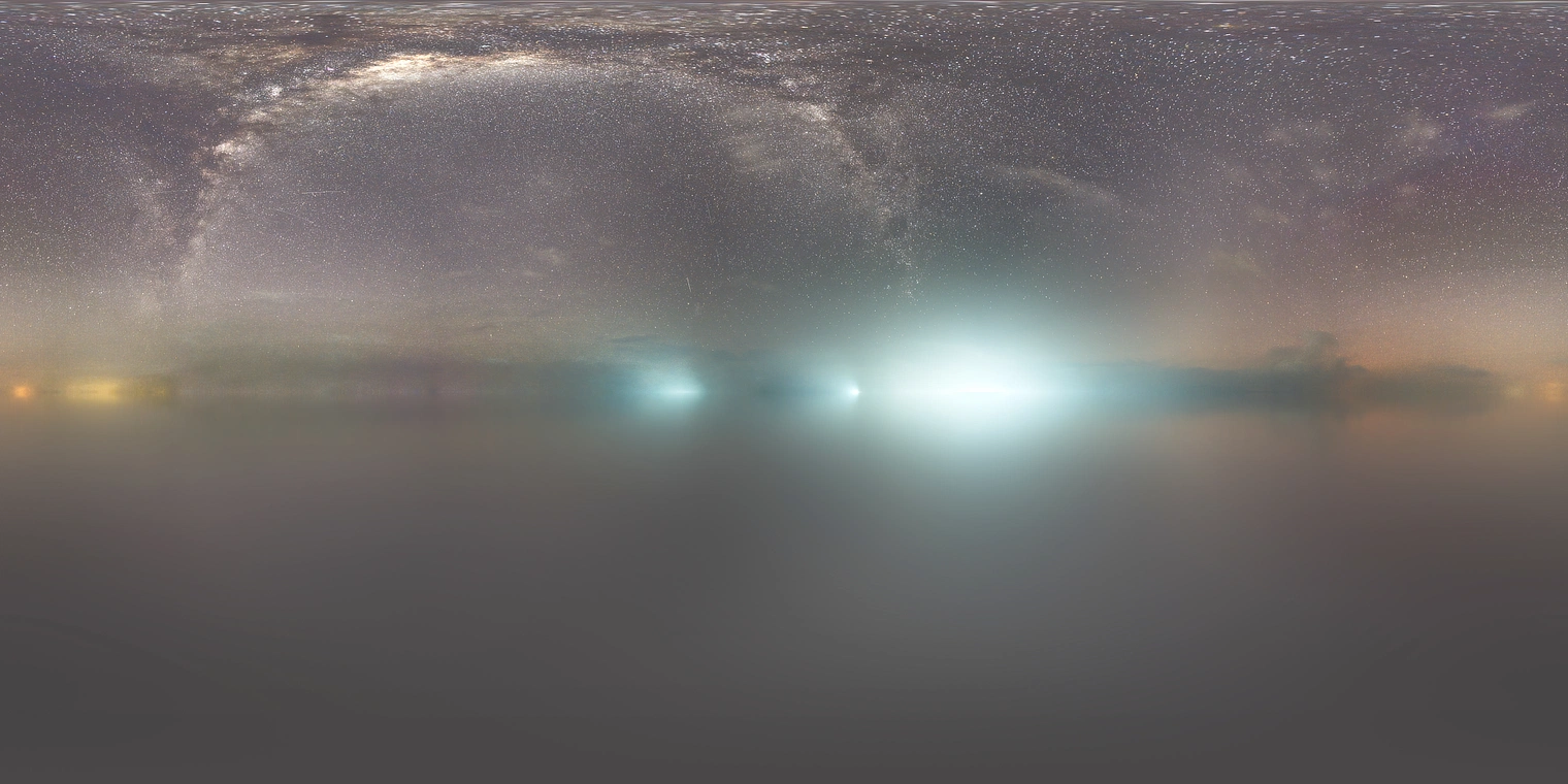 Free 24K unclipped HDRI - clear, low-contrast night sky with Milky Way and cool distant glows, great for subtle night lighting.