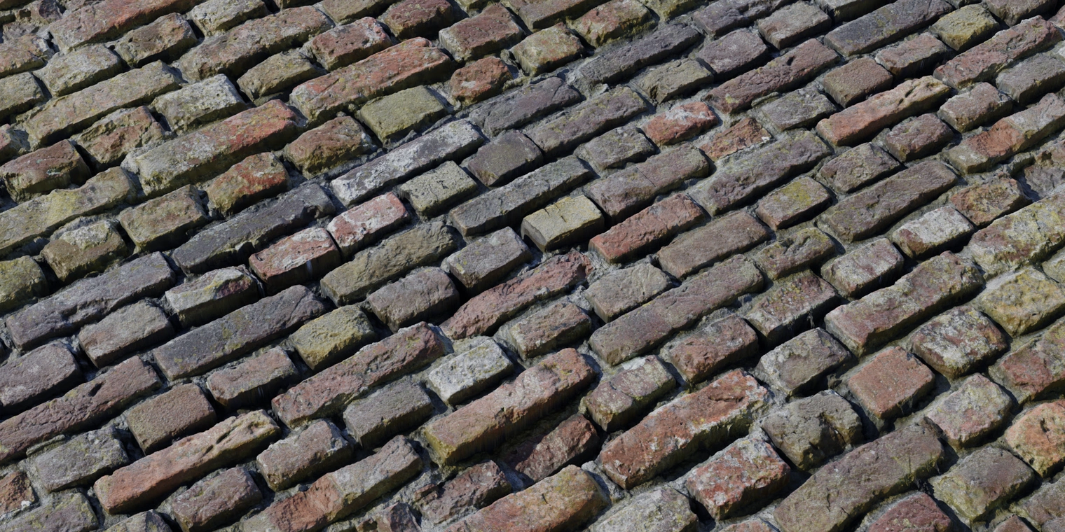 Free 8K texture of thick, weathered bricks - rough, uneven, discolored surfaces with moss, dirt and chipped, damaged edges.