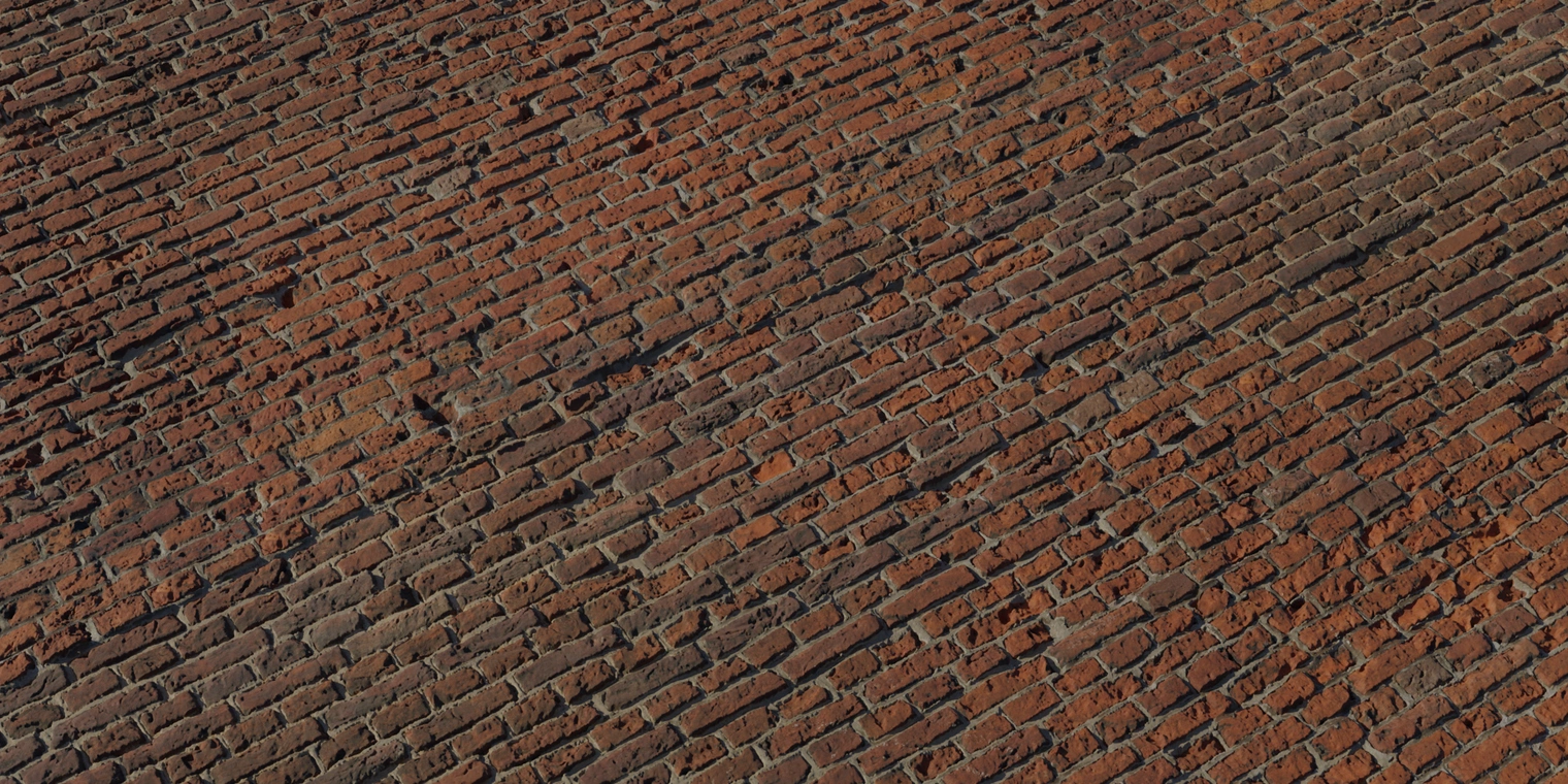 Free 8K texture of red, uneven baked bricks with rough surface, weathered edges and clean mortar; urban, detailed wall material.
