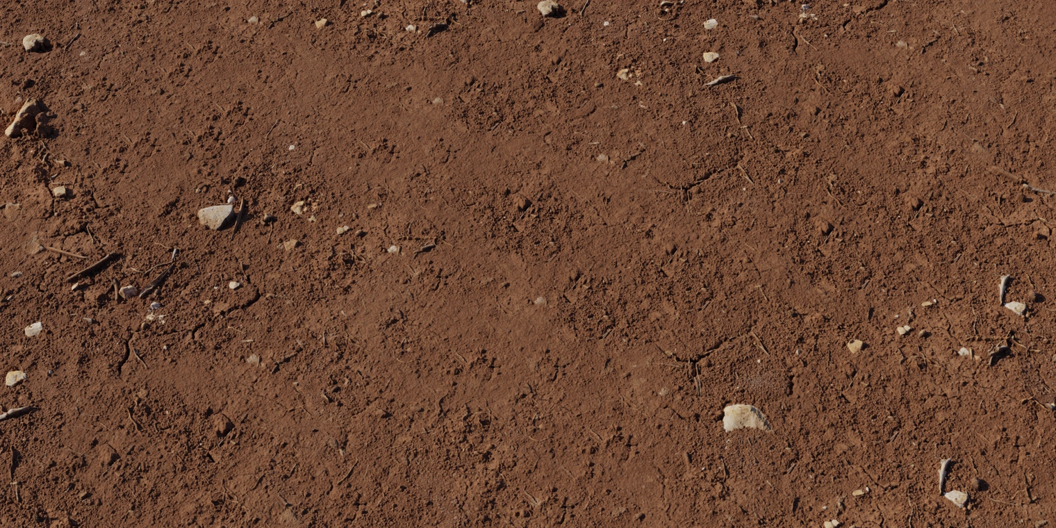 Free 8K texture: red mud stones - dry, compact reddish clay with fine cracks, scattered pebbles, root fibers and an earthy matte grain.