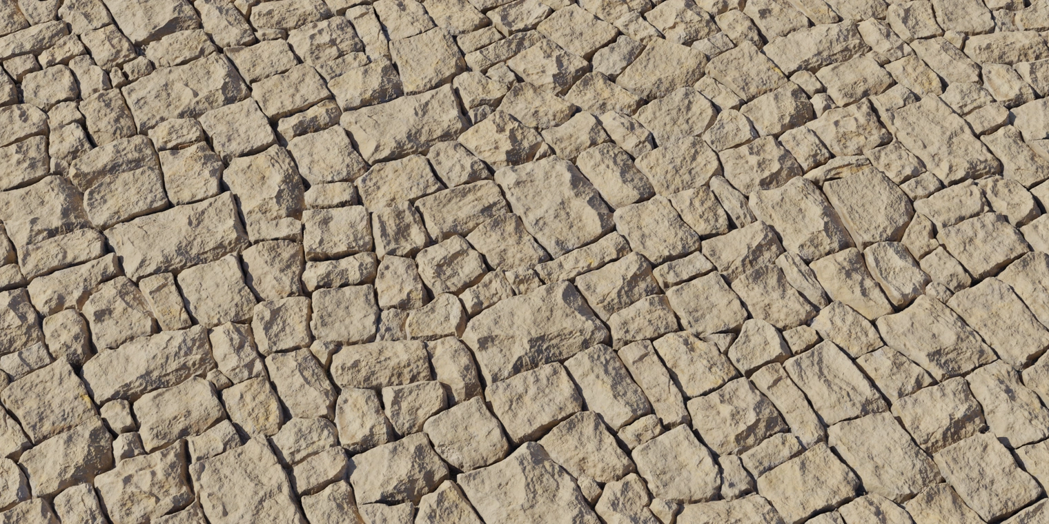 Free 8K texture of weathered stone wall: rough, chiseled blocks with sand-yellow discoloration, deep mortar joints and worn, weatherbeaten surface detail.