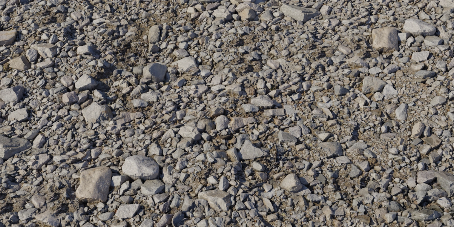 Free 8K texture of rough, cracked rocky ground with dense angular stones and gravel. Neutral gray-brown tones, deep cavities and gritty soil between rocks.